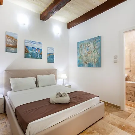 Designer With Comfy Sofa In By 360 Estates Apartment Valletta