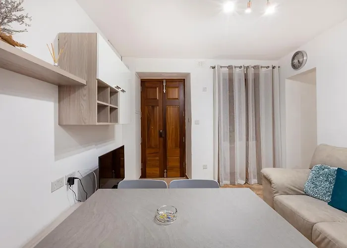 Designer With Comfy Sofa In By 360 Estates Apartament